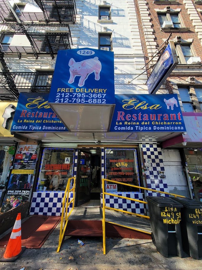 Unassuming Dominican restaurant storefront on St Nicholas Avenue.