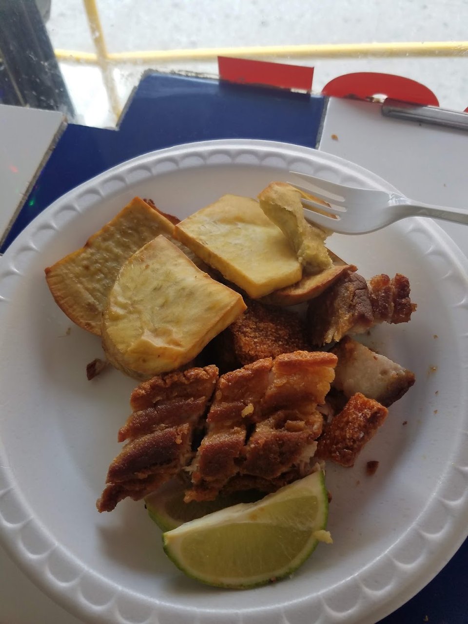 Menu-style plate with chicharrones and mofongo.